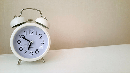 alarm clock on table